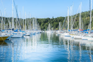 Sistiana, Trieste, Italy - July 28, 2015: Pleasure Boats moored in the harbor.